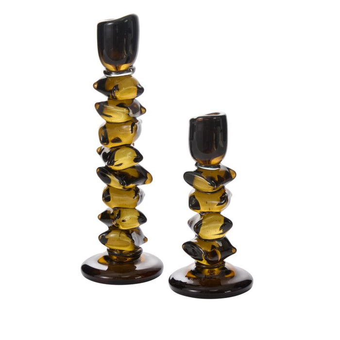 Set of two amber glass candleholders with an artistic, stacked organic design for home decor accents.