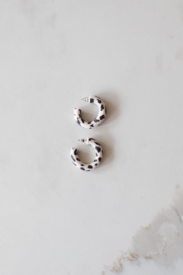 Dr Christine Earrings Black Cow Print