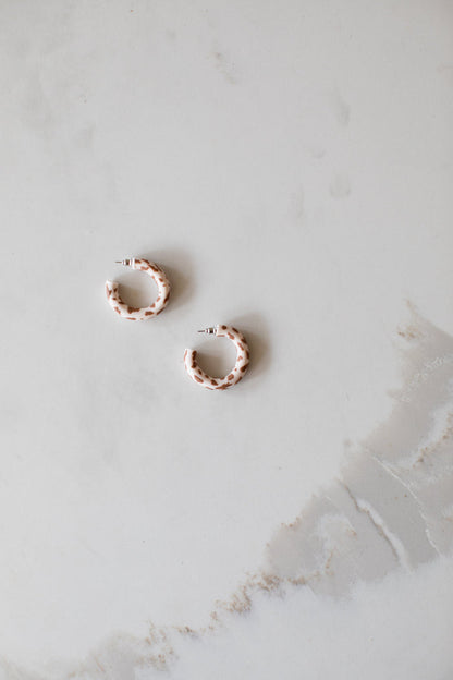 Dr Christine Earrings Black Cow Print
