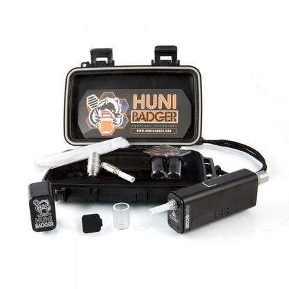 Huni Badger Vertical Vaporizer Kit, compact rechargeable device with accessories for versatile and portable concentrate dabbing.