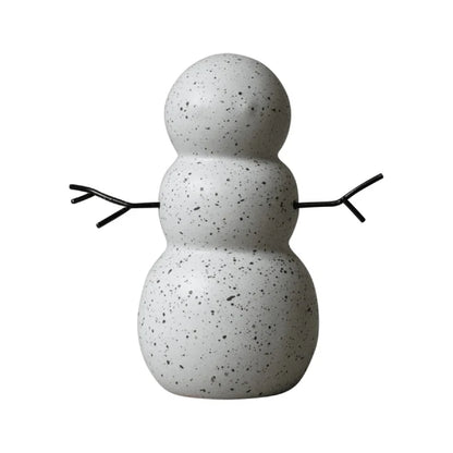 Speckled ceramic snowman figurine with minimalist design and black twig-like arms for modern home decor.