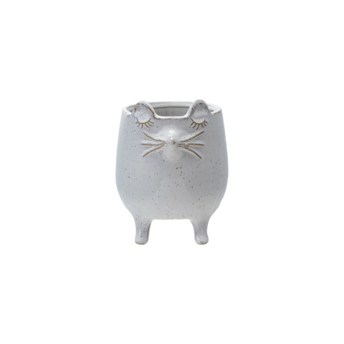 White ceramic planter shaped like a cute mouse with closed eyes and standing on four legs for home decor