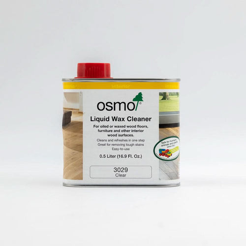 Can of clear liquid wax cleaner for wood floors and furniture with red cap and detailed label information