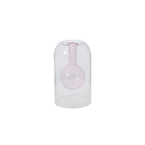 Transparent glass bud vase with a delicate pink bulb inside, perfect for minimalist home decor.