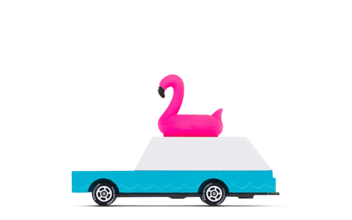 Toy wagon with a bright pink flamingo float on top and blue and white body with black wheels
