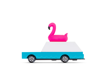 Toy wagon with a bright pink flamingo float on top and blue and white body with black wheels