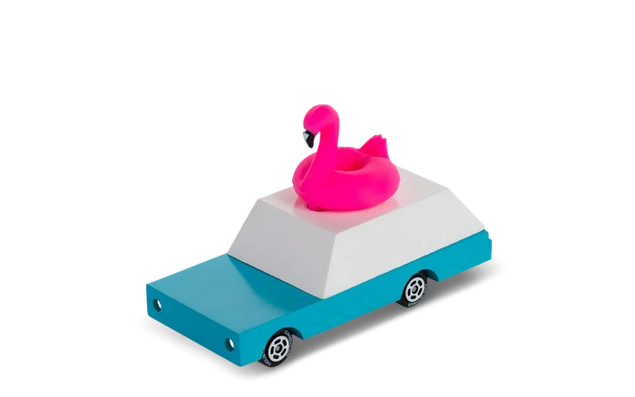 Toy wagon with bright pink flamingo figure and a blue and white rectangular base designed like a car.