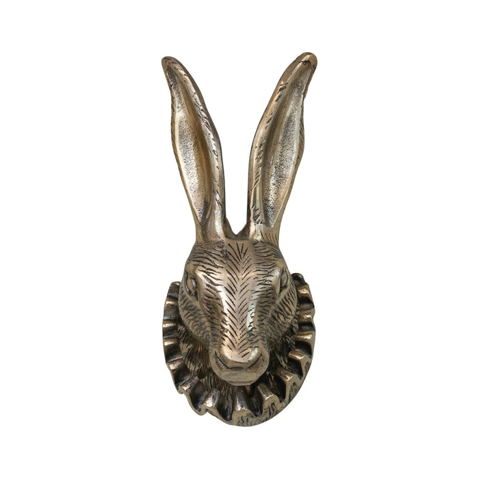 Decorative metallic rabbit head on a white background