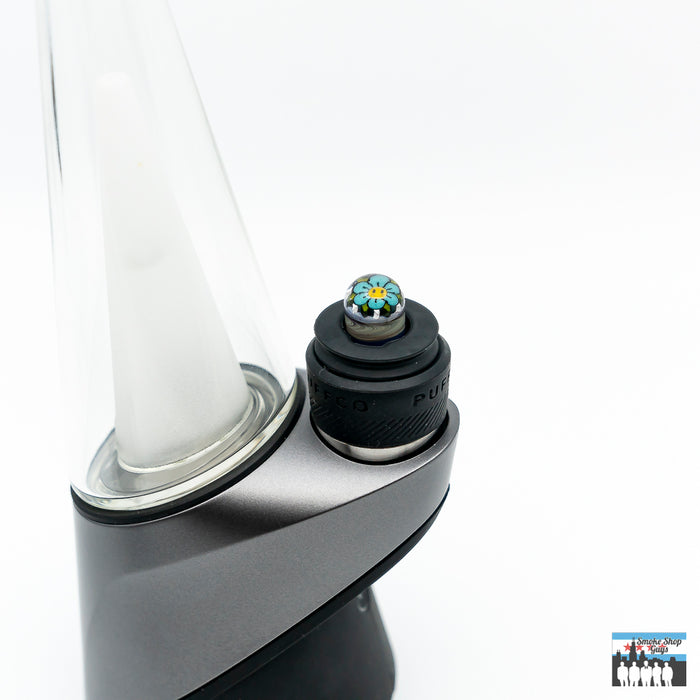 Blue Flower Glass Oculus Plug: Steve H Glass, Handcrafted for Puffco Peak Pro, Stunning Blue Flower Design, Personalized Artistic Touch, Secure Seal, Enhanced Performance, Vapor Retention, High-Quality Borosilicate Glass, Durability, Heat Resistance, Easy Installation, Maintenance, Style, Functionality.