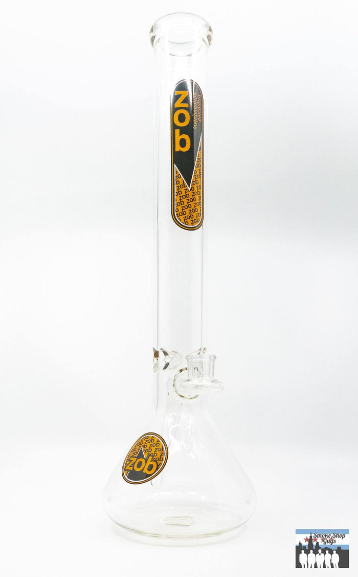 Zob 18-Inch Stemless Beaker Bong – Inline Diffuser for Superior Filtration: 18-Inch Tall Design, Excellent Smoke Cooling, Large Capacity, Inline Diffuser, Provides Efficient Smoke Filtration, Smooth Clean Hits, Stemless Construction, Eliminates the Need for Removable Downstem, Convenience, Durable Borosilicate Glass, Ensures Longevity, Resistance to Thermal Shock, Ground Glass Slide, Comes with 18mm Joint, Versatile Use.